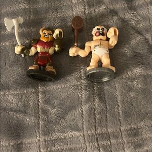 Action Figure Set with Red and Brown Accents